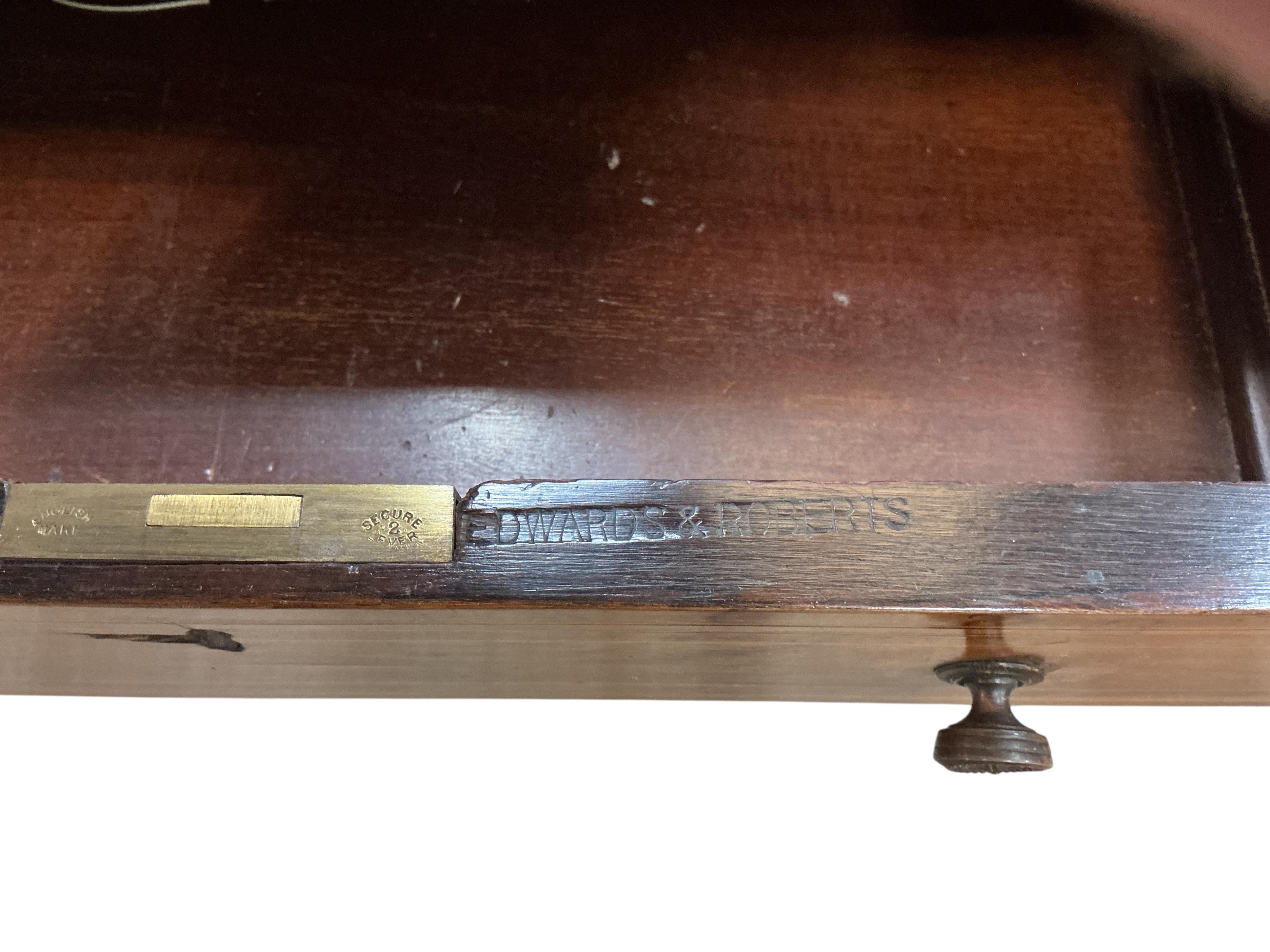An Edwardian Edwards & Roberts inlaid rosewood desk, width 107cm, depth 66cm, height 114cm